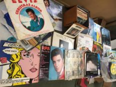 Quantity of Lps and records including Elvis Presley, T Rex, Buddy Holly, John Lennon, etc