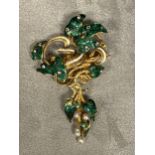 C19th, Unmarked yellow metal diamond and enamel seed pearl brooch, green enamel leaves with rose cut