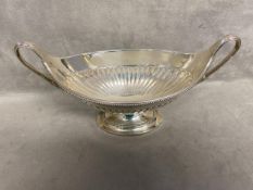 Sterling Silver half reeded bowl on oval stepped foot loop handles, 15oz by Charles Stuart Harris