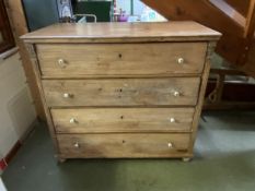 A large heavy pine chest of 4 long drawers 112 cm high x 123cm wide x 63cm wide