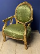 Small decorative gilded and green upholstered chair