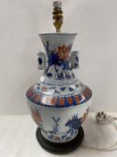 A china lamp base in the imari palette