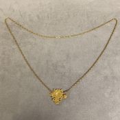 Unmarked yellow metal Chinese pendent on a 14ct gold ripe twist necklace, 22.5g