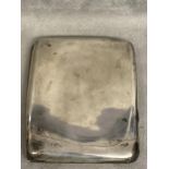 Sterling silver hip shaped cigarette case by Sampson Morden & co