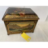 A decorative painted black and gilt box, with floral and landscape scenes