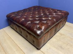 A good quality large square buttoned back brown leather stool, approx. 130cm square, 49cm high