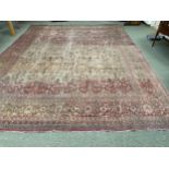 Large rug, reds, brown, orange all over stylized pattern, 343 x 430cm