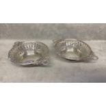 Pair of sterling silver pierced bowls with wreath and swag handles by Walker & Hall Birmingham 1904,