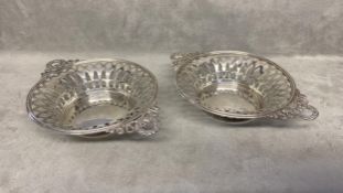Pair of sterling silver pierced bowls with wreath and swag handles by Walker & Hall Birmingham 1904,