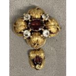 9 ct garnet and diamond flower brooch