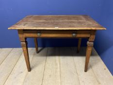 An oak side table, with central drawer and tapering legs 103cm wide x 66cm depth x 73cm high,