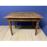 An oak side table, with central drawer and tapering legs 103cm wide x 66cm depth x 73cm high,