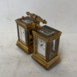 Small double brass carriage clock set one as a clock, the other as a barometer. 10.5 cm H