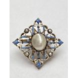 Late C19th blister pearl diamond and enamel brooch, by Carlo Giuliano. Marked CG to oval