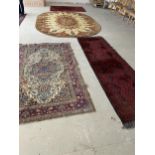 4 Rugs, 1 x oval brown, cream, reds, 346 x 250cm; 1 x runner 89 x 290cm; 2 other rugs 140x235, 128 x