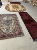 4 Rugs, 1 x oval brown, cream, reds, 346 x 250cm; 1 x runner 89 x 290cm; 2 other rugs 140x235, 128 x