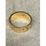 14ct gold wedding band with textured bark effect decoration, 8 grams, size M