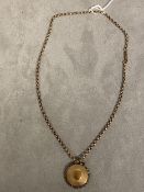 Victorian yellow metal mourning pendant on a yellow metal chain link necklace