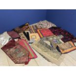 A quantity of textiles, including wall hangings apparently from Myanmar, and a ethnic/tr