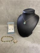 A suite of 18ct gold ring with emerald, pendant, 9ct gold bracelet with emeralds and a necklace