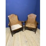 Pair of bergère cane arm chairs