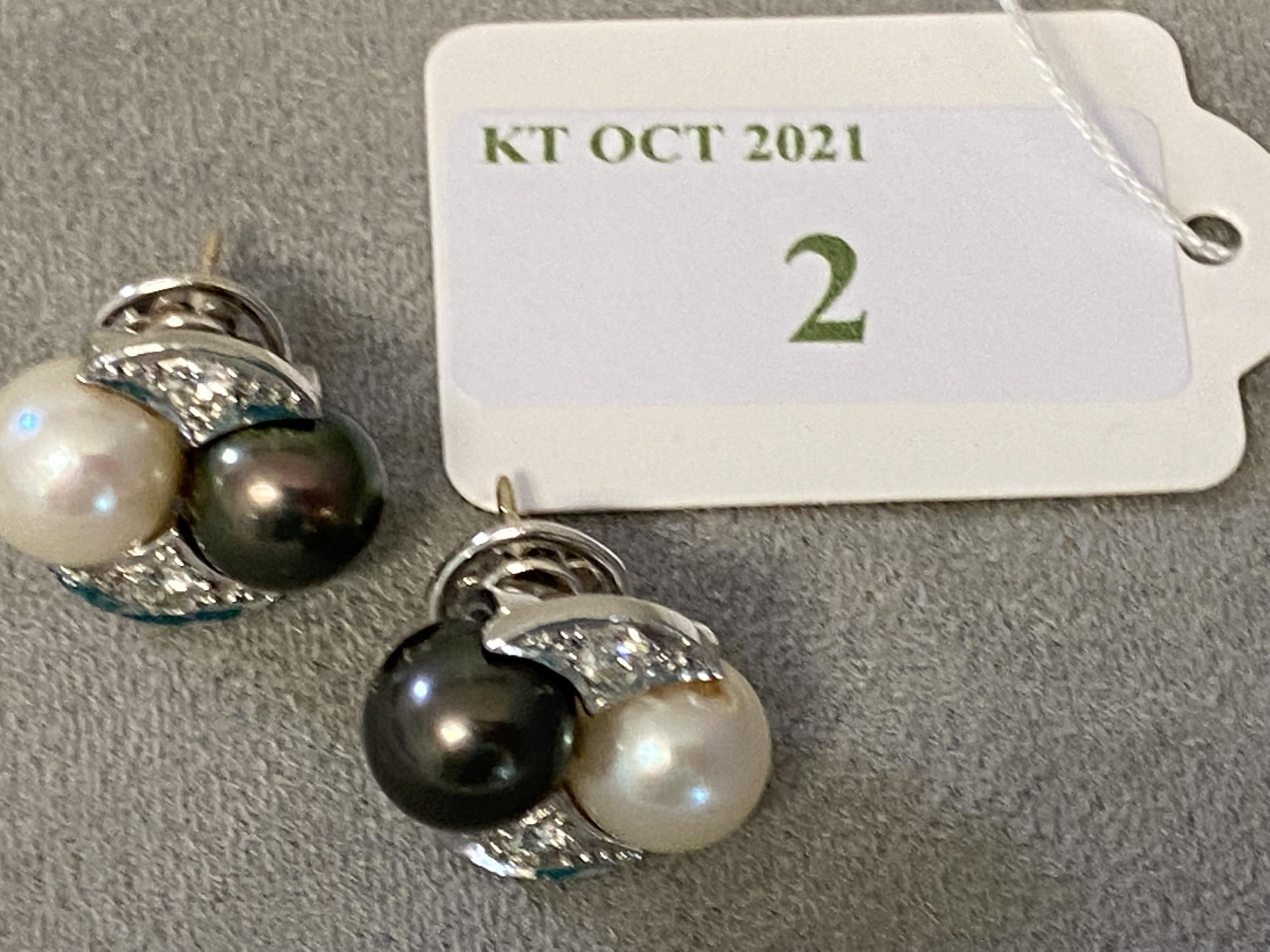 Pair of 18ct white gold and platinum Tahitian white and black pearl ear studs, with diamond accents, - Image 3 of 3