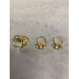 Unmarked yellow metal aqua/tourmaline marine and diamond dress ring, central oval free cut sapphire,