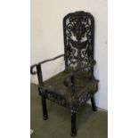 A heavy decorative wrought iron high backed iron chair, the seat inscribed "Class 2 to weigh 5cwt,