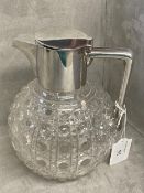 Sterling silver mounted cut glass claret jug, of bulbous form with star cut base, height, 18cm High