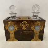 Unusual fine quality possibly coromandel wood small brass bound and locking tantalus with Wedgwood