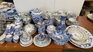 A quantity of good, decorative blue and white wares, including part tea services, dishes and covers,