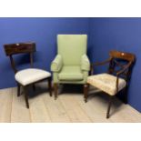 A green upholstered square framed arm chair on wooden legs to castors, and two other antique chairs
