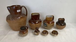 Qty of Royal Doulton jugs, embossed hunting scenes & pepperettes, miniature pots etc, & Doulton