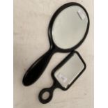 Two ebony hand mirrors