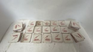 Qty of hand painted Delft tiles decorated with pink Oriental fishing boat scenes