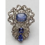 Late C19th/early C20th Sapphire and diamond brooch, set with 3 free cut sapphires, central untreated