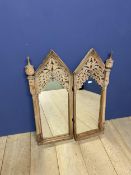 A pair of decorative, gothic style tall rectangular wall mirrors, with pointed arches set with
