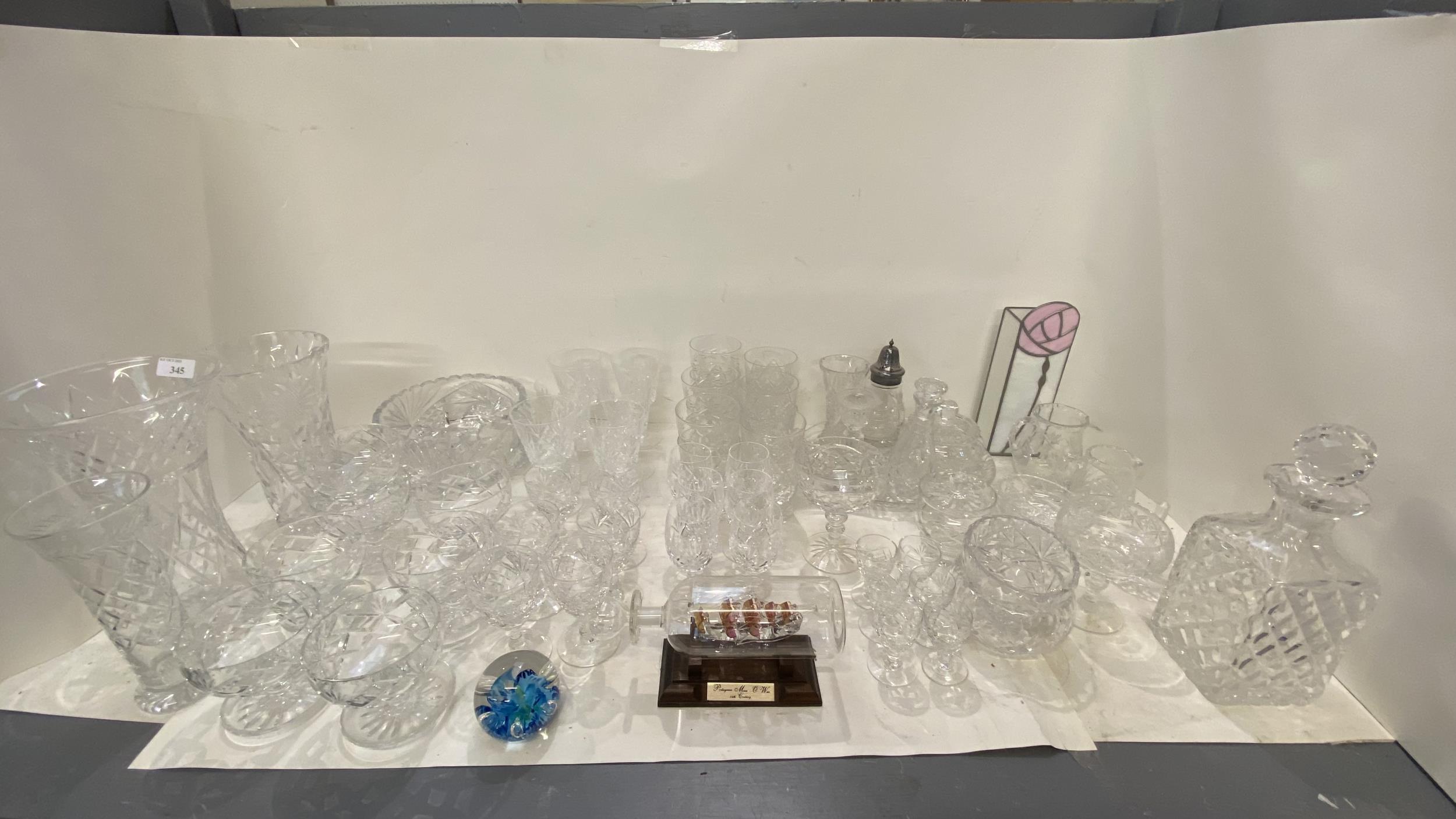 Large qty of glass wear including decanters, vases, wine glassed, tumblers etc.