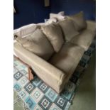 A very good quality, and very comfortable, deep, large green upholstered low