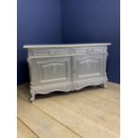 A metallic grey painted ornate French style sideboard, with a cream marble stepped top, decorated