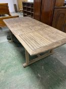 A good teak garden table and quantity of garden chairs