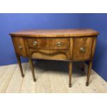 Mahogany bow front side board, with fitted cutlery central drawers, brass handles, 130cm wide,