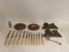 A small hallmarked silver sugar sifter and spoon; fish knives and forks; and brass ware plaques etc,