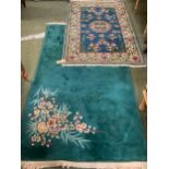 2 rugs, 1 x Chinese rug, green with flowers, 230 x 136cm; and 1 x blue rug with cream and pink
