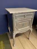 A bedside table, decorated in a metallic grey style paint and a white top & A metallic grey