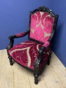 Victorian heavily carved show framed open armchair with contemporary purple/pink upholstery