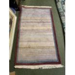 Modern rug, in pinks, cream, purple stripes, and brown borders, 93 x 155cm