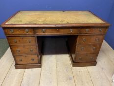 Mahogany pedestal 9 drawer desk , tooled leather top, and key present, some staining to top see