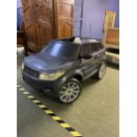 A Child's electric Range Rover Sport, takes 1 driver, 1 passenger.In working order in the Auction