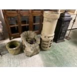 Garden items: stone pots, chimney pot and decorative candle sconce and a cast iron stove